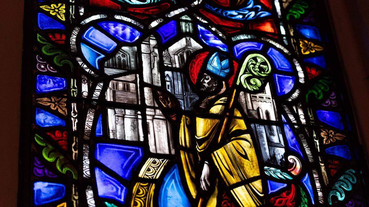 A saying glass window artwork depicting a biblical scene inside Trinity Episcopal Cathedral during a Vox Dei, new service of Holy Eucharist, on Sunday, September 7, 2025, in Miami, Fla. Trinity Episcopal Cathedral is celebrating the centennial anniversary of the church.