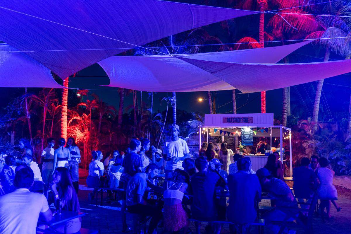 Guests gather to eat, drink and listen to music at ZeyZey in Little River.