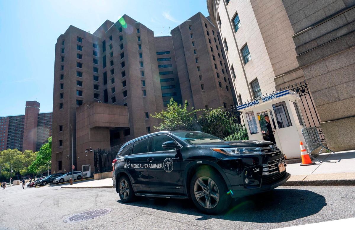A New York Medical Examiner’s car is parked outside the Metropolitan Correctional Center, where financier Jeffrey Epstein was being held and where he apparently committed suicide Saturday, Aug. 10, 2019.