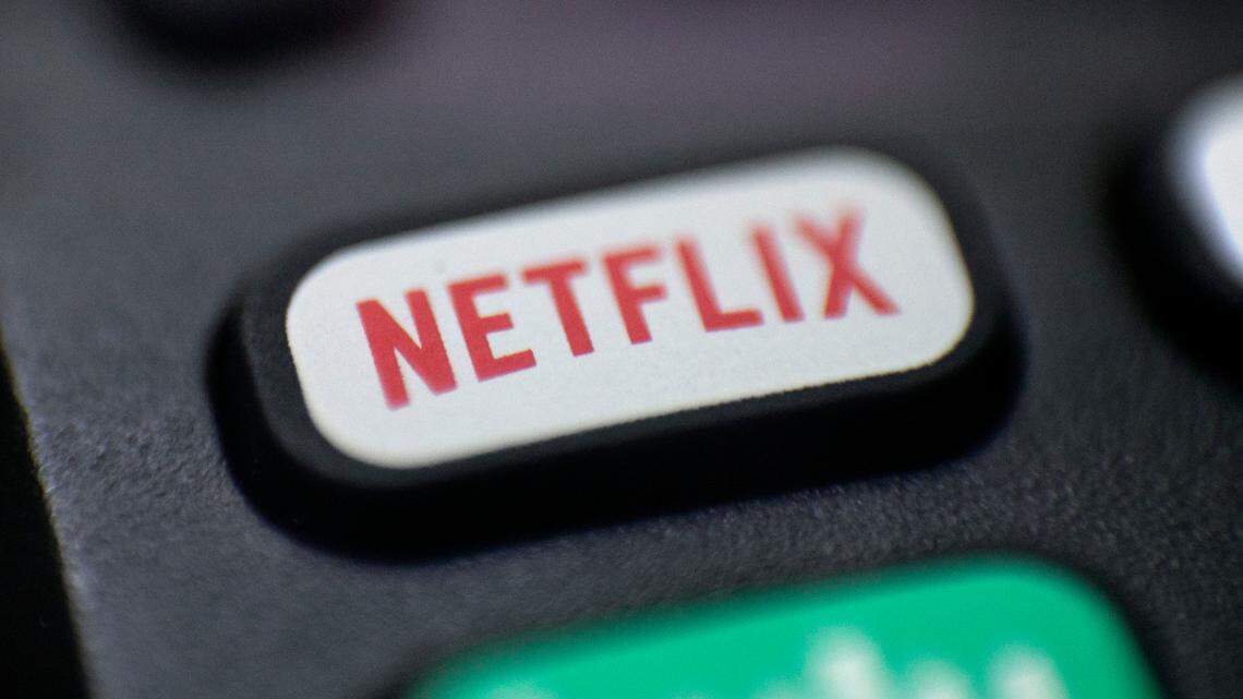 Netflix is testing out a new feature to limit password sharing and encourage paid subscriptions. (AP Photo/Jenny Kane, File)