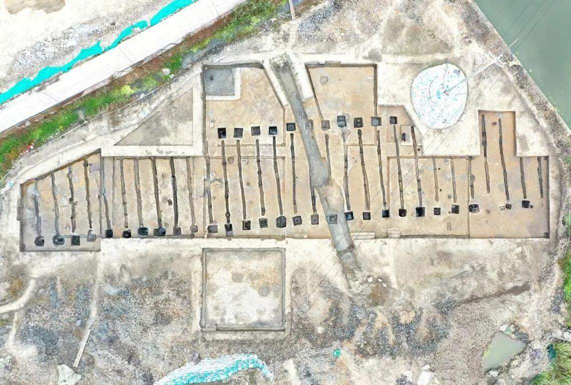 An aerial view of the large ceremonial building shows its intricate design.