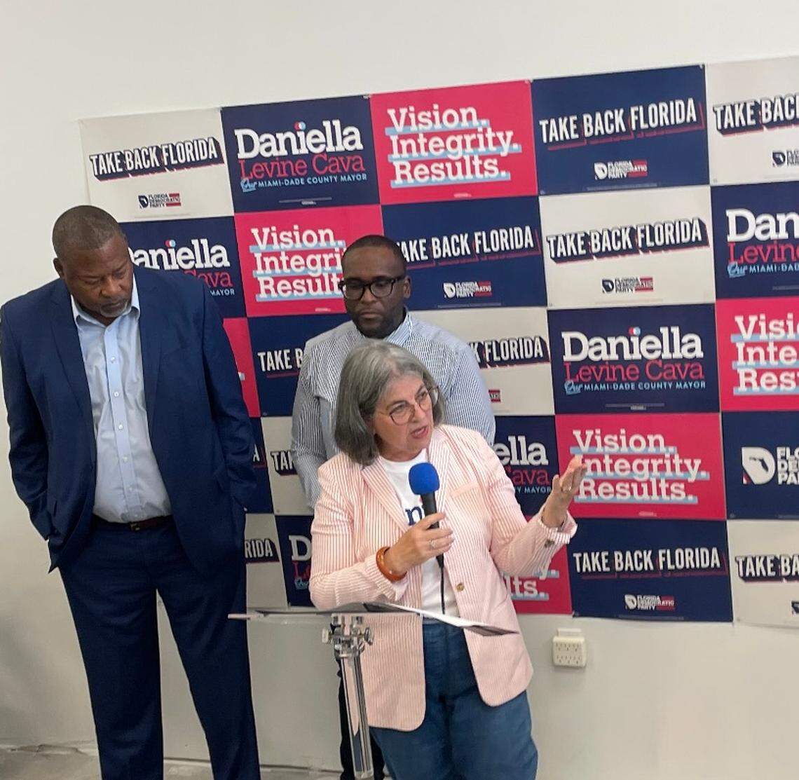 Miami-Dade Mayor Daniella Levine Cava speaks at the opening of a campaign office in Miami Gardens that her reelection campaign is sharing with Florida’s Democratic Party. Behind her, left to right, are Miami Gardens Mayor Rodney Harris and Florida Sen. Shevrin Jones, the new chair of Miami-Dade’s Democratic Party.