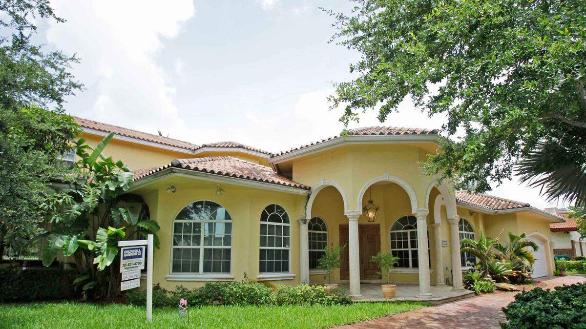 More buyers are spending at least $500,000 over a listing price in the Miami metro area, according to a recent Zillow study. Above: A house for sale in Miami Lakes, Fla. in July 2010.