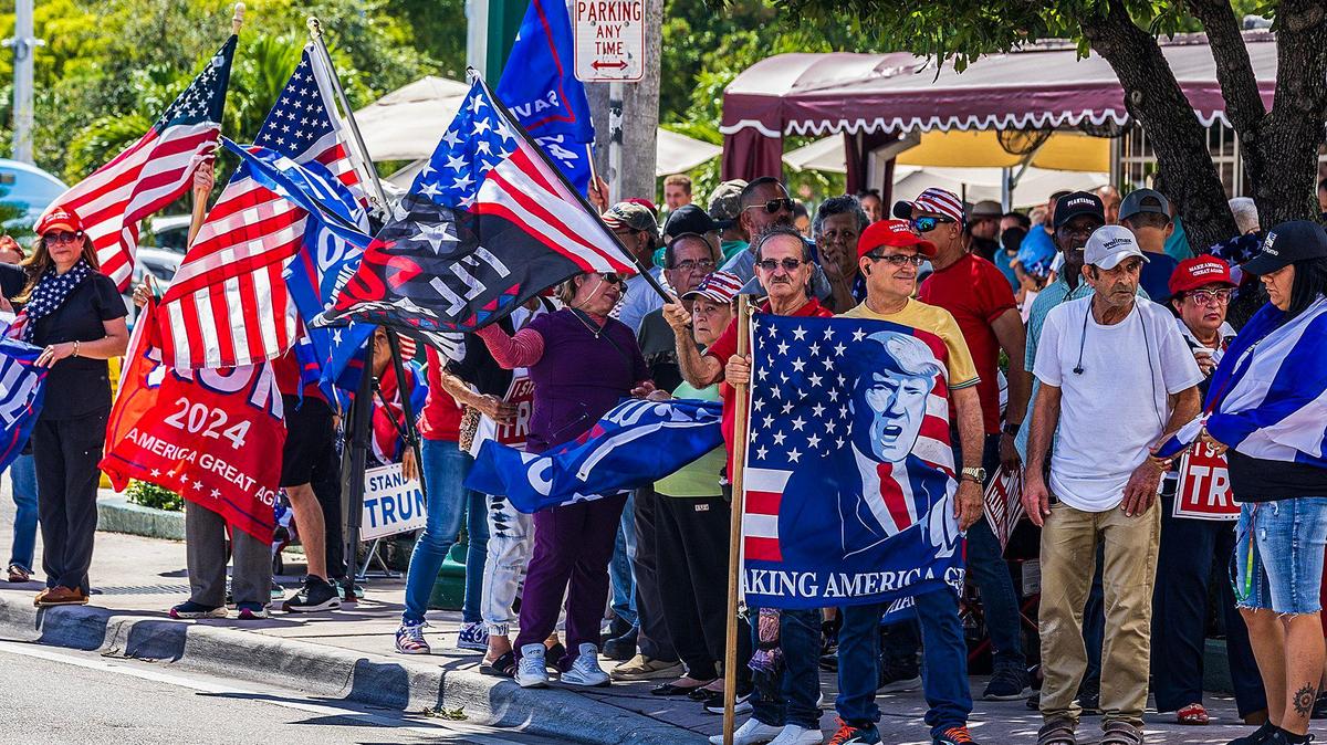 Cuban exiles gather at Versailles Restaurant in Little Havana in support of former President Donald Trump, in Miami for his arraignment at the Federal Courthouse on June 13.