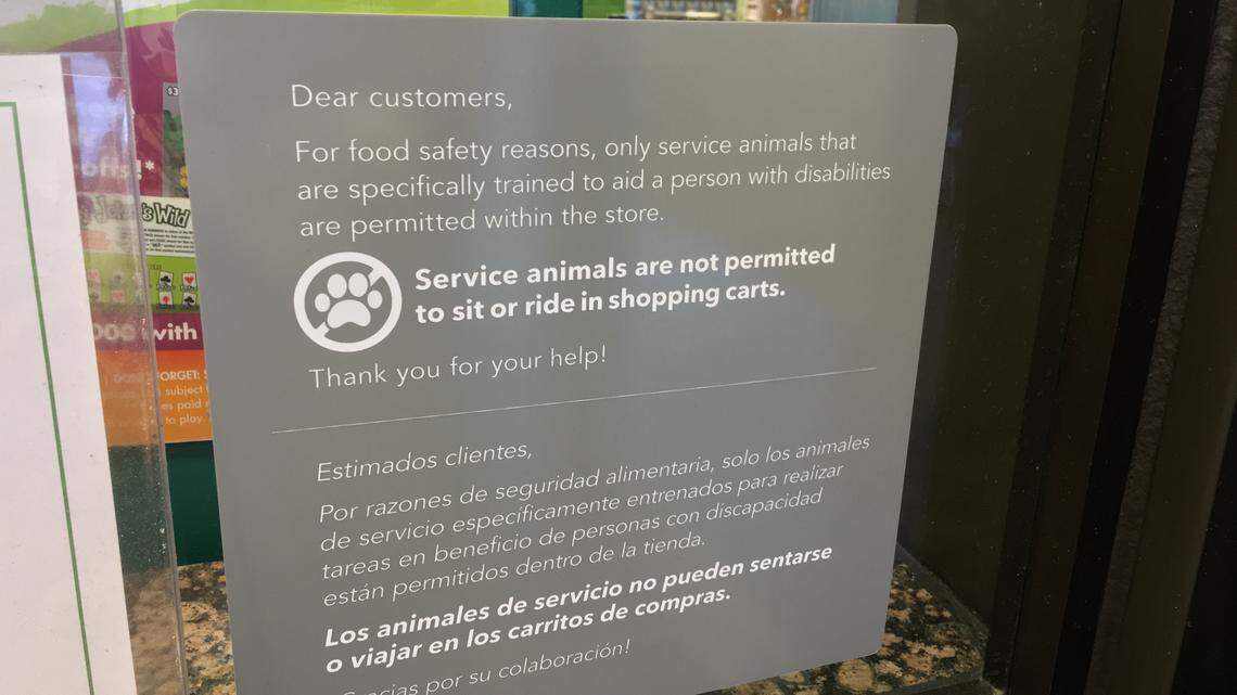 Publix signage at its supermarkets instruct customers on its policy on service animals. Keeping animals out of the grocery carts has been spelled out on the signs.