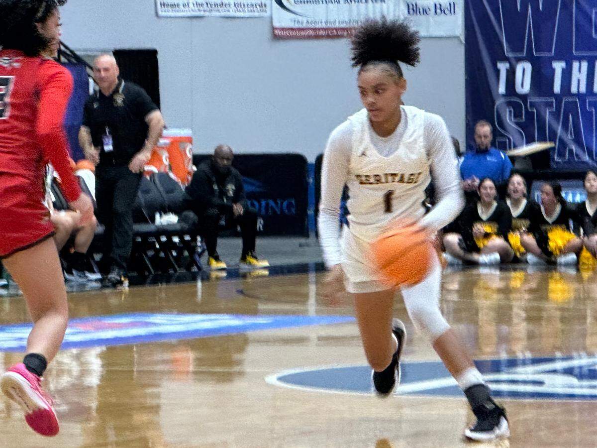 American Heritage guard Taniyah Davis looks for an opening in the defense during Wednesday’s Class 5A state semifinal against Port Charlotte at the RP Funding Center in Lakeland.