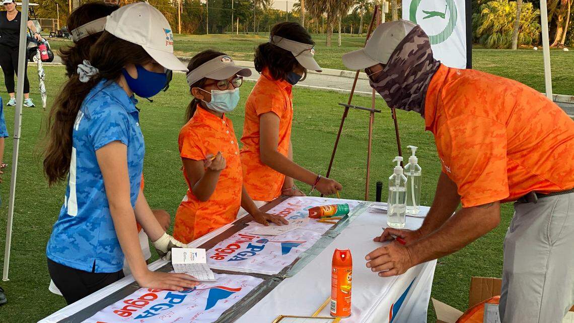 Kids sign up for free golf lessons. Alex Fernandez, who has run the Key Biscayne-based Crandon Golf Academy since founding it in 2007, is helping to provide the lessons for children as part of the PGA Junior League.
