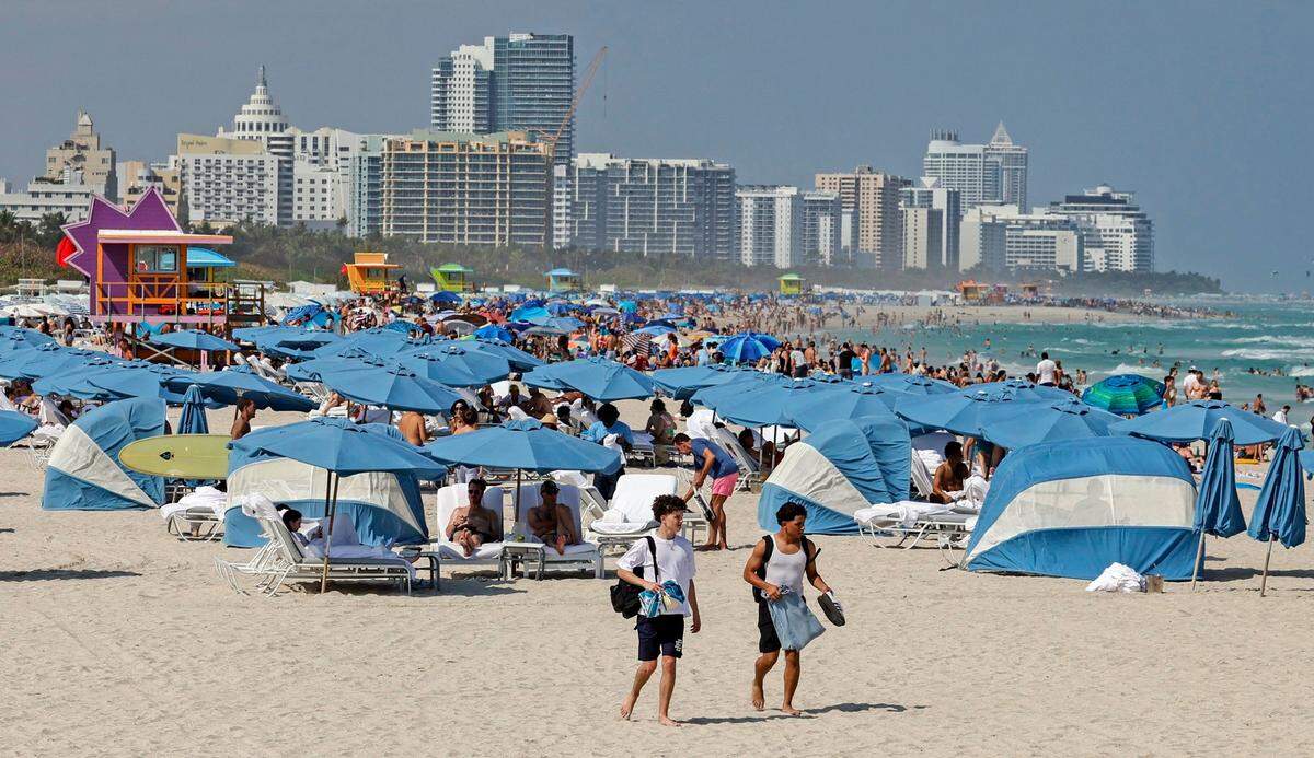 Beachgoers crowd South Beach during spring break on Miami Beach, Florida on Saturday, March 9, 2024.