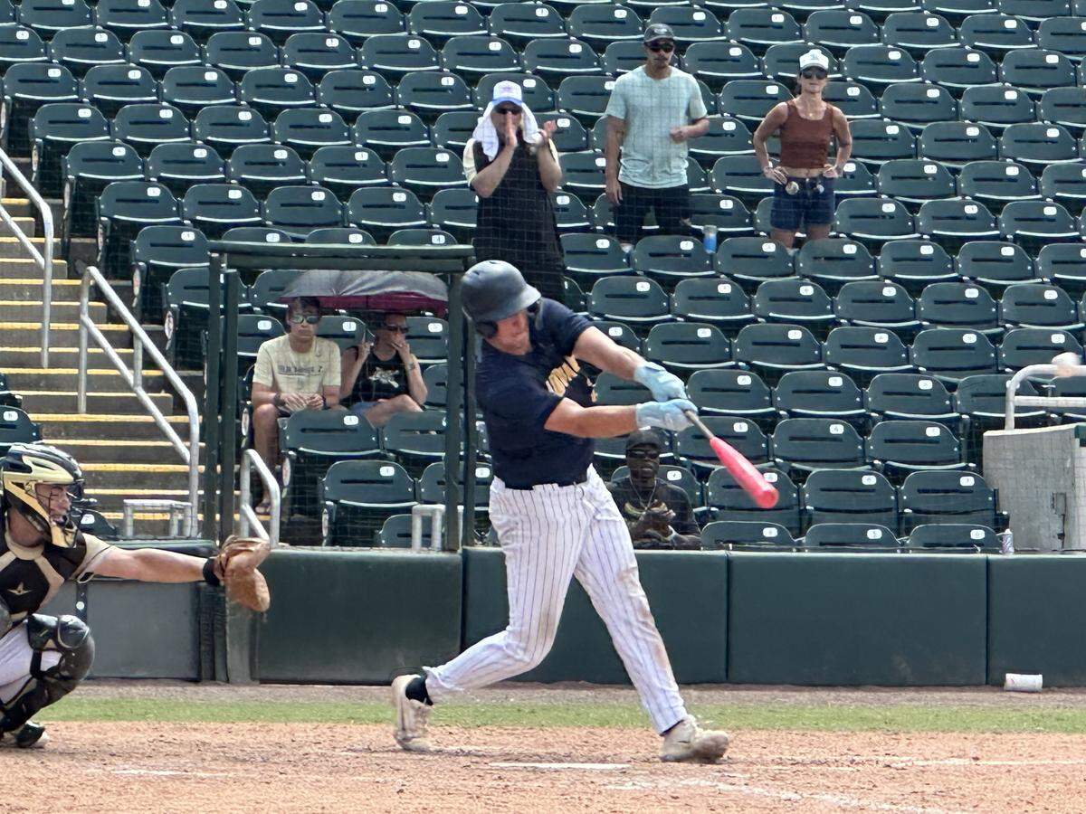 St. Thomas Aquinas senior Brady Buxbaum singles to drive in a run in the top of the seventh inning of Saturday’s Class 6A state baseball championship game against Gainesville Buchholz at Hammond Stadium in Fort Myers, Fla.