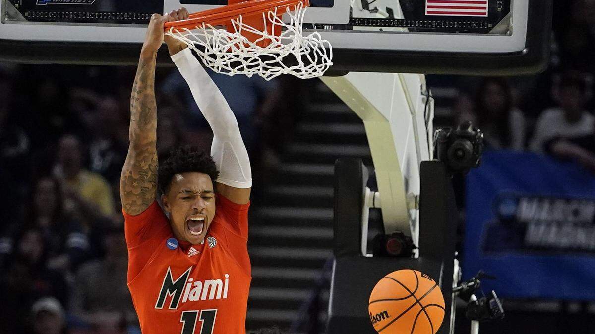 Miami’s Jordan Miller (11) dunks during the second half of a college basketball game against Southern California in the first round of the NCAA tournament, Friday, March 18, 2022, in Greenville, S.C. (AP Photo/Brynn Anderson)