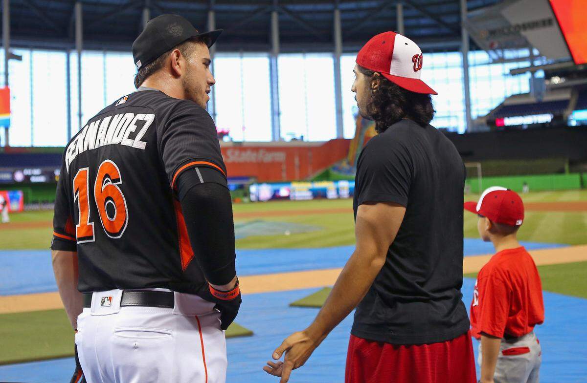 Miami Marlins pitcher Jose Fernandez talks with Washington Nationals pitcher Gio Gonzalez before the start of the game on May 20, 2016 at Marlins Park in Miami.