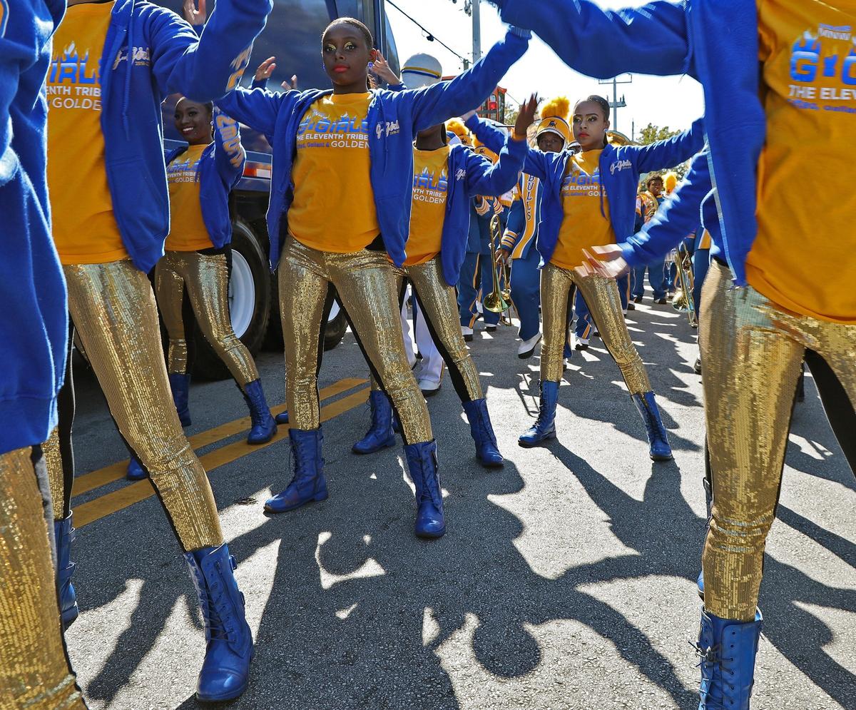Miami Northwestern High School marching band and dancers rehearse before the start of Monday’s parade honoring Martin Luther King Jr. in Liberty City.