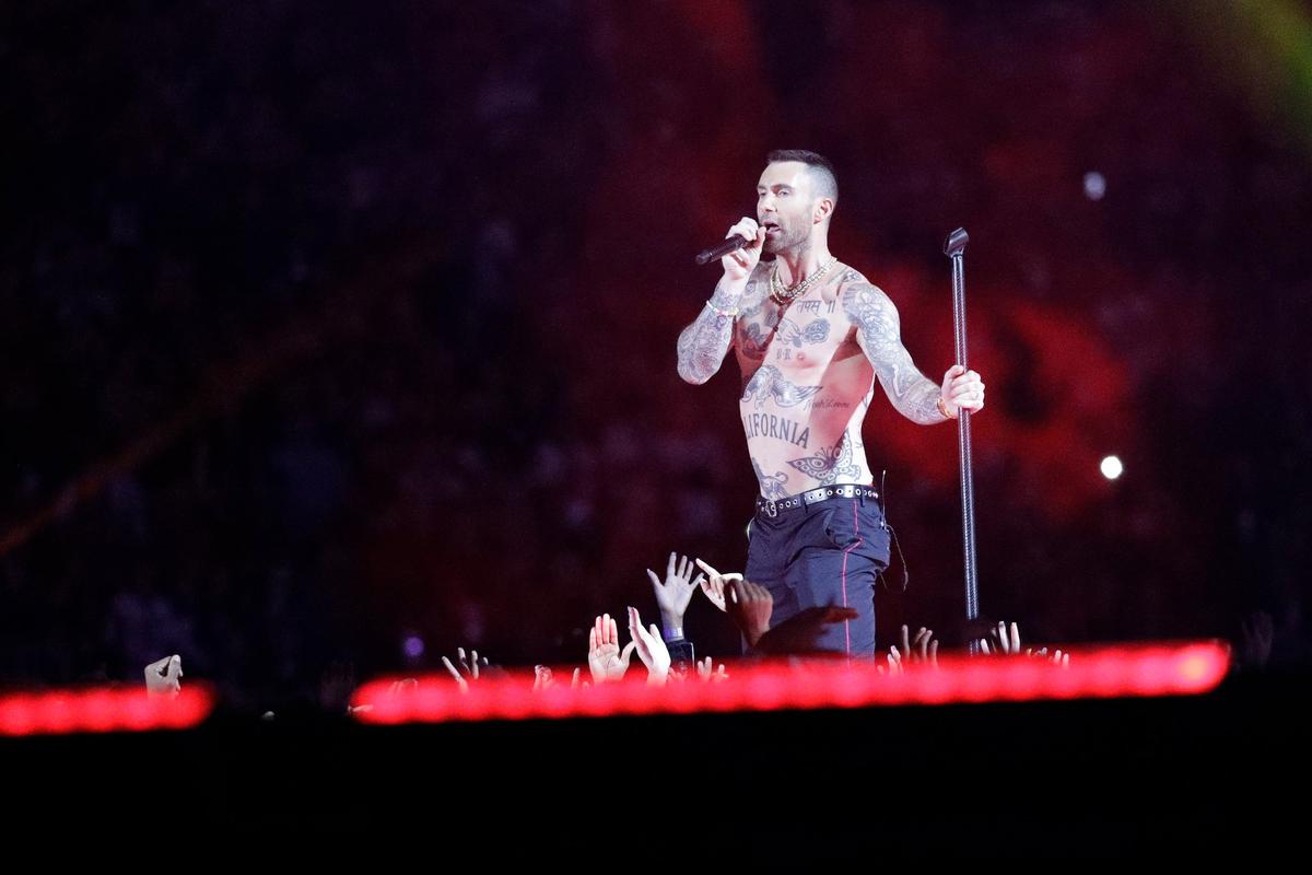 Adam Levine of Maroon 5 performs during halftime of the NFL Super Bowl 53 football game between the Los Angeles Rams and the New England Patriots, Sunday, Feb. 3, 2019, in Atlanta. (AP Photo/John Bazemore)