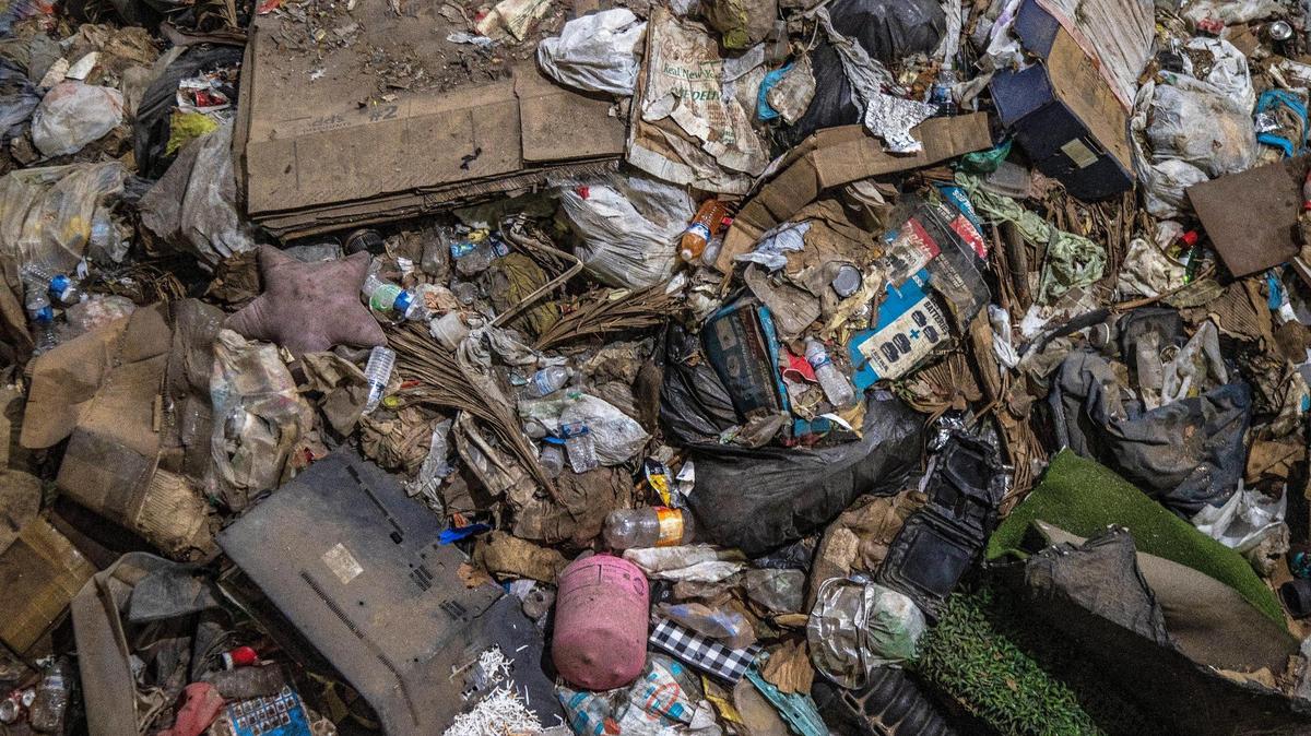 View of a pile of trash collected around South Florida, at the Miami-Dade Resources Recovery Facility in Doral, on Friday April, 14, 2022, less than a year before a fire shut down the facility in February 2023.