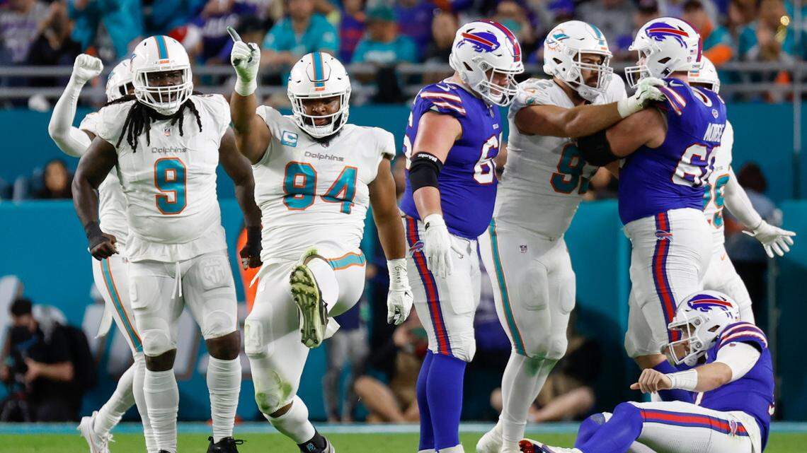 Miami Dolphins defensive tackle Christian Wilkins (94) reacts after sacking Buffalo Bills quarterback Josh Allen (17) in the first quarter at Hard Rock Stadium in Miami Gardens on Sunday, January 7, 2024.
