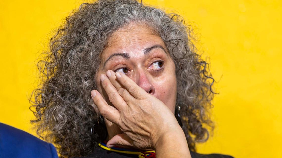 ‘All For Venezuela’representative Mayra Marchan wipes away tears during a press conference held by Venezuelan American Caucus and hosted at El Arepazo on Monday, Feb. 3, 2025, in Doral.