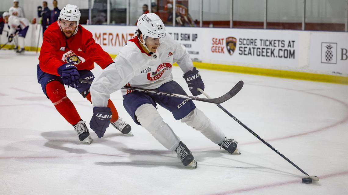 Florida Panthers forward Mackie Samoskevich (25) controls the puck during practice drills at Florida Panthers IceDen in Coral Springs, Florida on Thursday, September 21, 2023.
