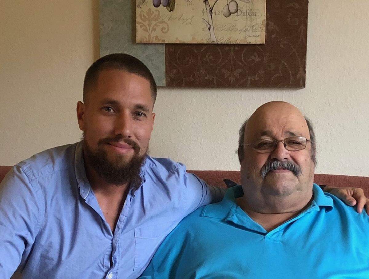 Sergio Rodriguez Sr. (right) poses with his son, also named Sergio. The Cuban-American father-son duo support Bernie Sanders in the 2020 presidential primary.