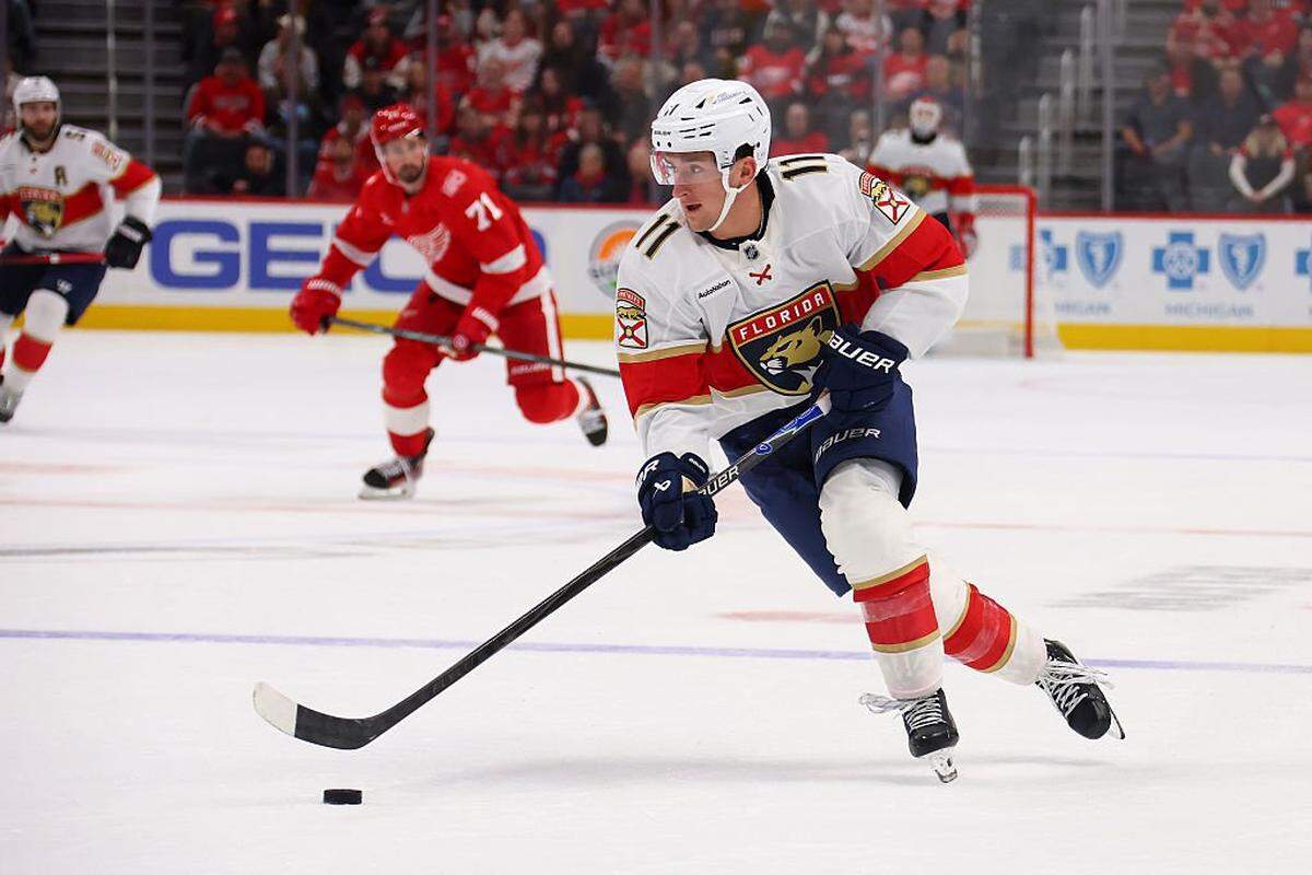 DETROIT, MICHIGAN - OCTOBER 15: Mackie Samoskevich #11 of the Florida Panthers heads up ice in the first period while playing the Detroit Red Wings at Little Caesars Arena on October 15, 2025 in Detroit, Michigan. (Photo by Gregory Shamus/Getty Images)