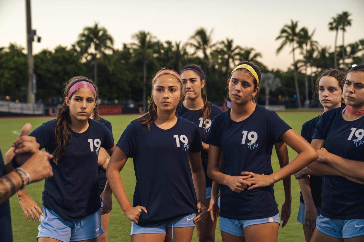Lourdes players wear the No. 19 on their practice shirts in honor of teammate Katy Puig, who has been hospitalized since being injured in a boating accident in the Florida Keys on Labor Day weekend, which claimed the life of Lourdes student Lucy Fernandez.