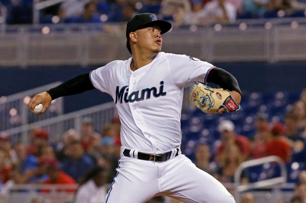 Miami Marlins pitcher Jordan Yamamoto (50) pitches during the second inning of an Major League Baseball game against the St. Louis Cardinals at Marlins Park in Miami on Wednesday, June 12, 2019.