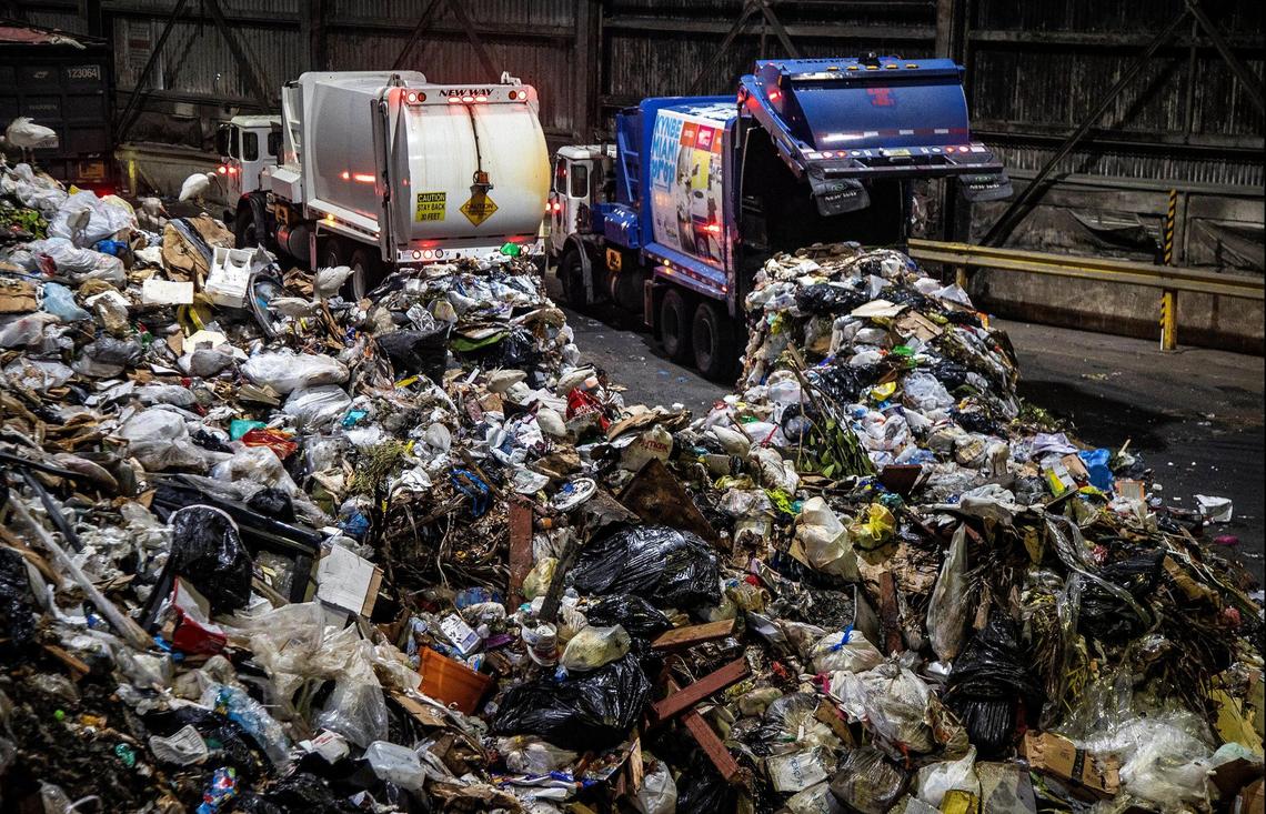 Trucks download trash collected around South Florida at the Miami-Dade Resources Recovery Facility-Covanta Energy incinerator plant located at 6990 NW 97th Ave. in Doral on April, 14, 2022.