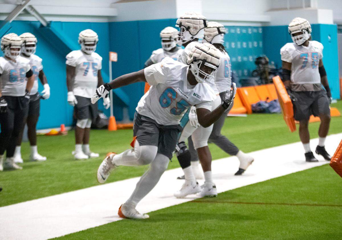 Miami Dolphins offensive guard Robert Jones (65) do drills during NFL football training camp at Baptist Health Training Complex in Hard Rock Stadium on Thursday, September 2, 2021 in Miami Gardens, Florida.