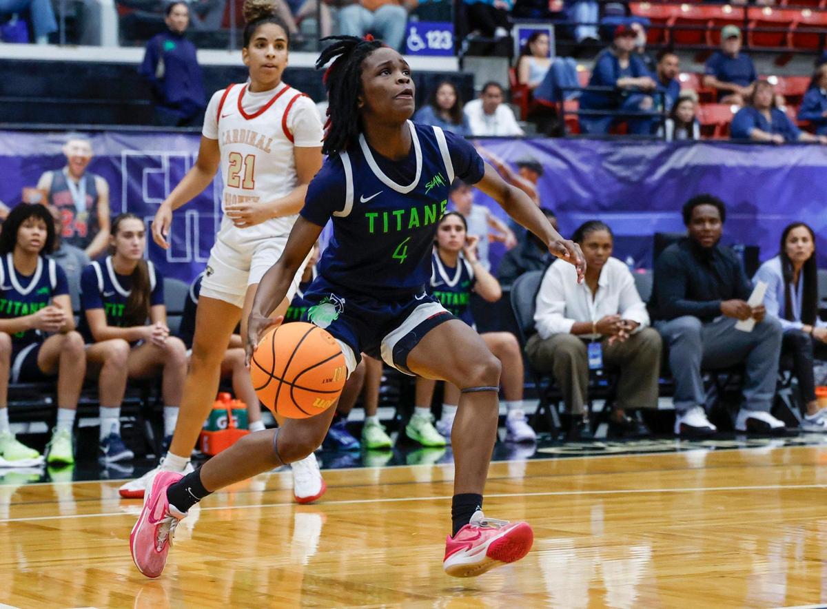 SLAM Miami Titans Makayla Turner (4) drives to the basket against Cardinal Mooney in the second half during girls 3A basketball semifinal game of the Florida High School State Championships at the RP Funding Center in Lakeland, Florida on Friday, February 28, 2025.