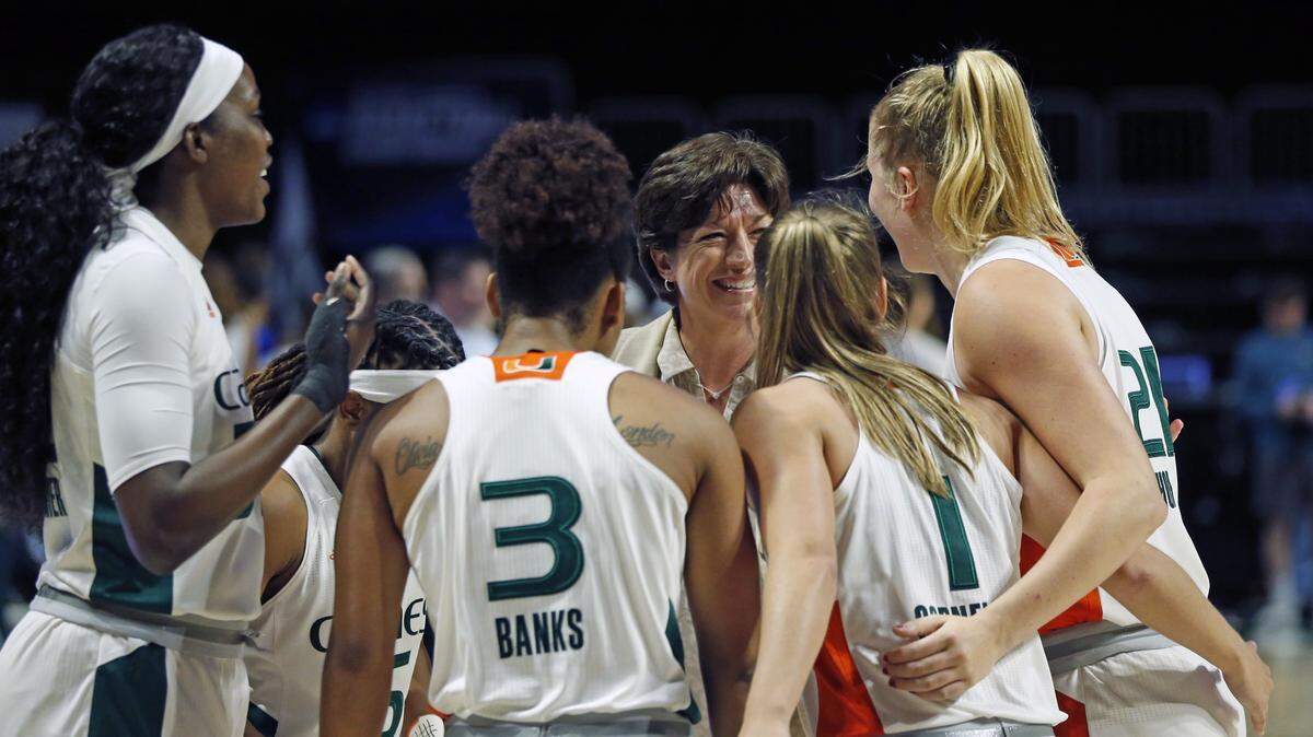 Miami Hurricanes coach Katie Meier on the court with team as the University of Miami plays Florida Gulf Coast Eagles during the first round women’s NCAA College Championship at the Watsco Center in Coral Gables on Friday, March 22, 2019.