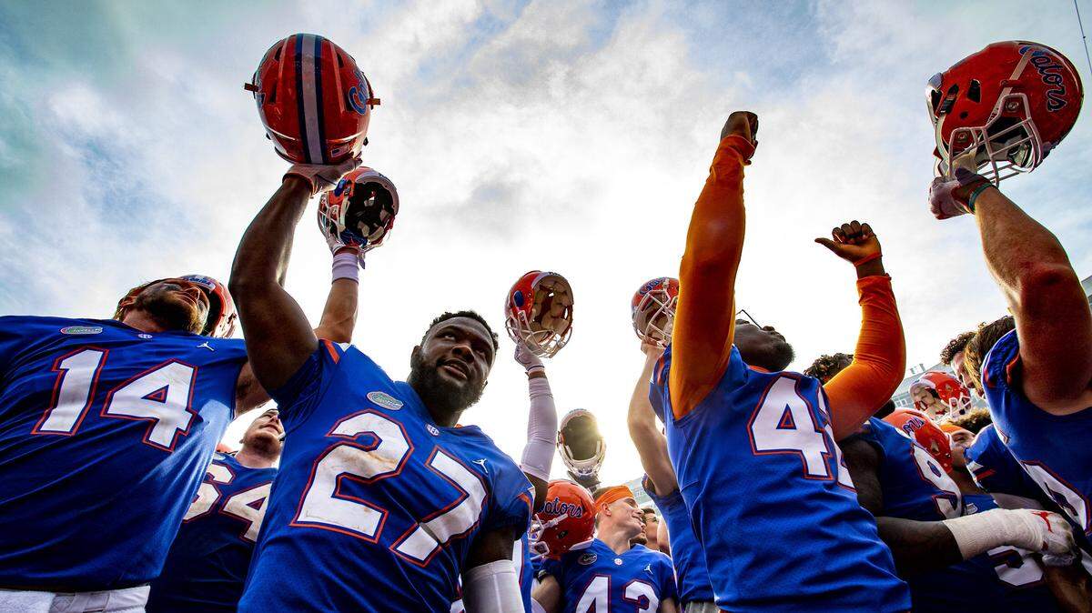 Florida players celebrate after they defeated South Carolina in an NCAA college football game, Saturday, Nov. 10, 2018, in Gainesville, Fla.