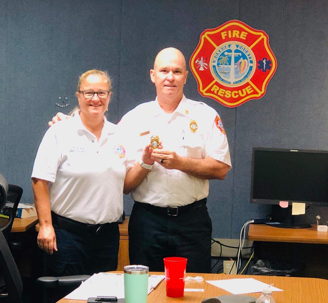 Lynda Rusinowski, left, receives her chief flight nurse badge from Deputy Chief of Operations Steve Hudson in 2019. “She has shown exceptional leadership skills since taking on her new role,” the Monroe County Fire Rescue posted on its Facebook page at the time.