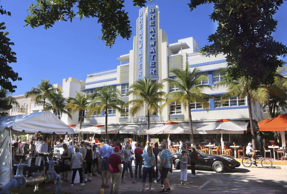 The Breakwater and other historic hotels in Miami Beach’s Ocean Drive as seen in 2016 during Art Deco Weekend. Bills advancing in the Florida legislature would override local protections in coastal cities for historic buildings like the Ocean Drive hotels and allow their demolition and  redevelopment.
