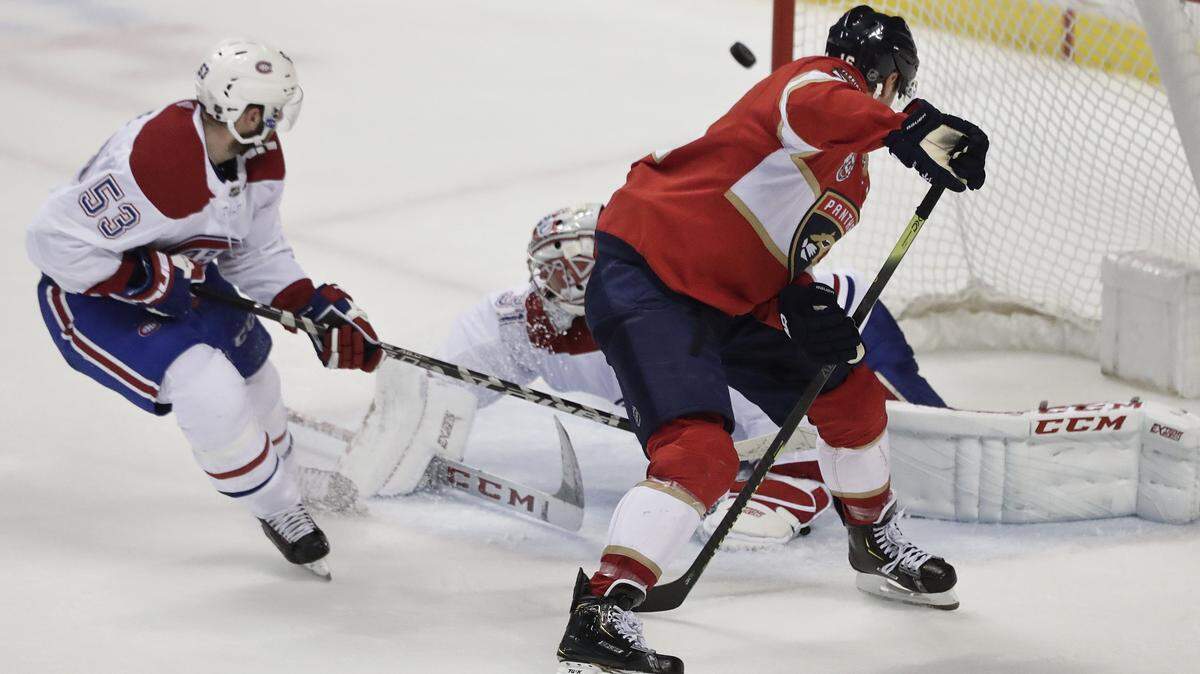 Florida Panthers center Aleksander Barkov shoots and scores against Montreal Canadiens goaltender Carey Price during the second period of an NHL hockey game against the, Sunday, Feb. 17, 2019, in Sunrise, Fla.