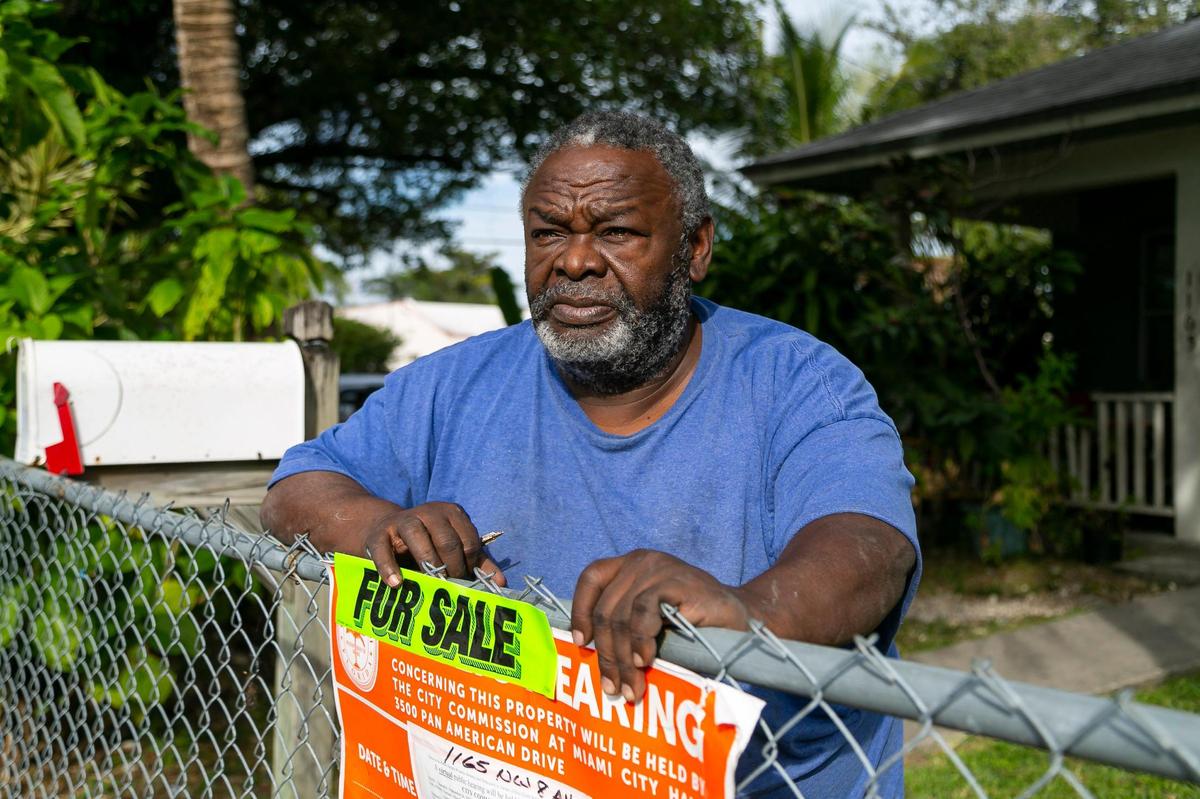 Jose Montero, 60, is seen at his home in Miami’s Highland Park neighborhood. Montero is selling his home, built by Habitat for Humanity of Greater Miami in 1997, and has been offered $700,000 by an investment group.