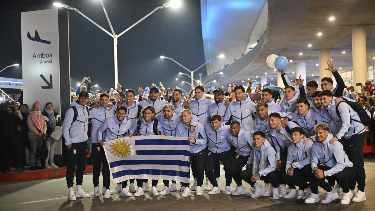 Uruguay's national football team pose for a picture at Carrasco International Airport ahead of their departure to Mexico for the FIFA 2026 World Cup football tournament, in Ciudad de la Costa, Canelones department, Uruguay, on June 9, 2026. (Photo by Santiago Mazzarovich / AFP via Getty Images)