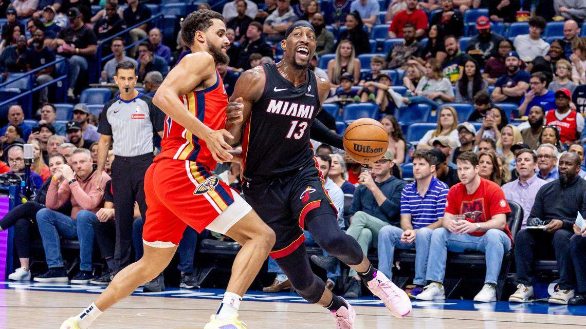 Miami Heat center Bam Adebayo (13) dribbles against New Orleans Pelicans forward Jeremiah Robinson-Earl (50) during the first half at Smoothie King Center.