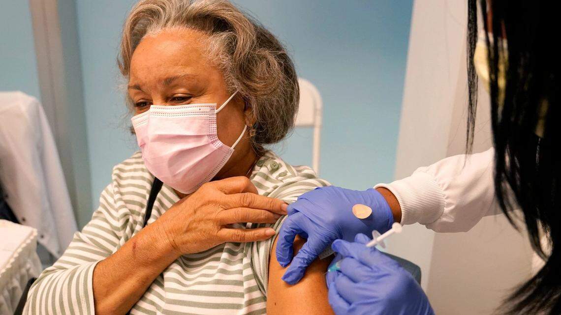 Irma Mesa, 74, receives the Pfizer-BioNTech COVID-19 vaccine at the Jackson Hospital in Miami in January.