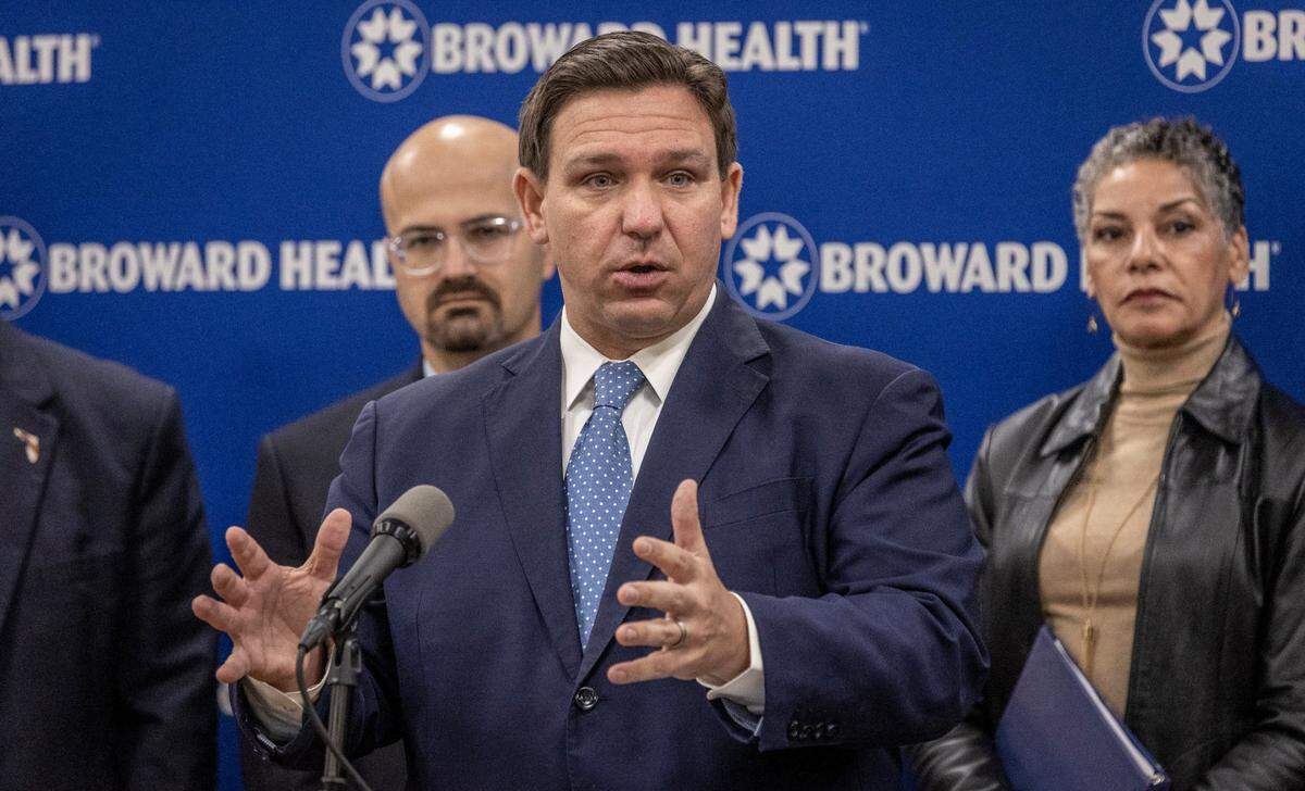 Florida Gov. Ron DeSantis speaks during a press conference at Broward Health Medical Center in Fort Lauderdale on Jan. 3, 2022. He urged the federal government to send 30,000 to 40,000 more doses of monoclonal antibody treatments to Florida.