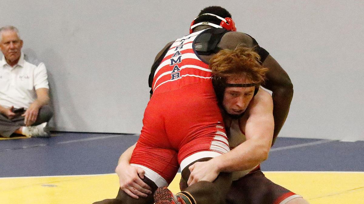 Michael Mocco, Cardinal Gibbons, wrestles Maxinot Mondesir, Miramar, during 215 lb BCAA Wrestling Championship on Saturday, February 3, 2024 at Pompano Beach HS in Pompano Beach. Andrew Uloza / for Miami Herald