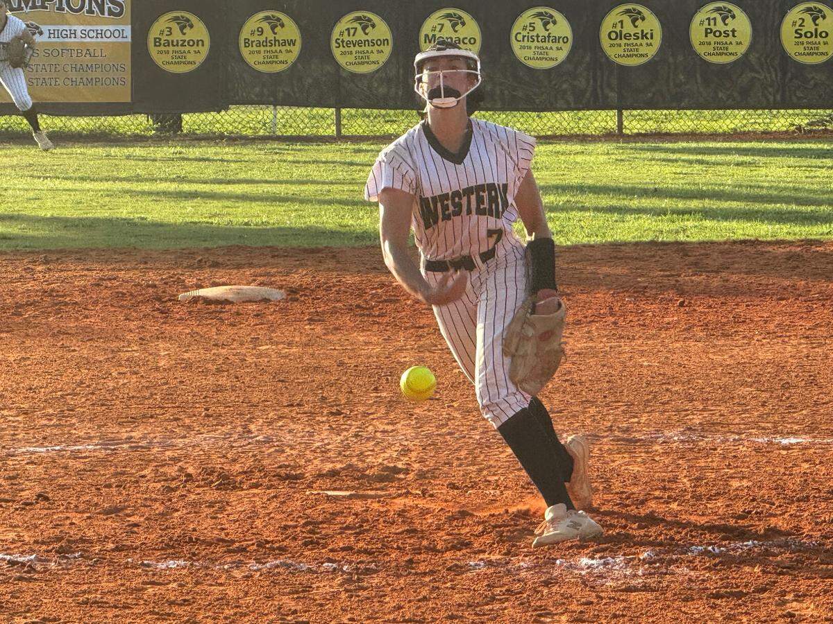 Western softball pitcher Ali Solo pitches against West Broward during Thursday night’s Region 4-7A final at Western High School in Davie, Fla.