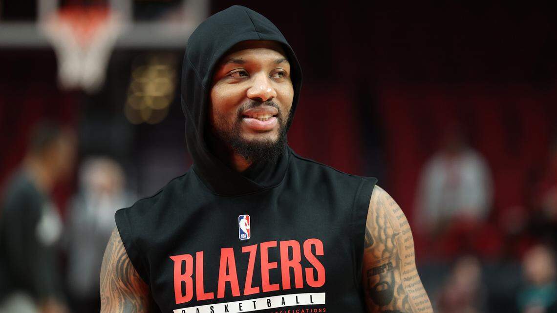 Portland Trail Blazers guard Damian Lillard (0) participates in warmups before playing LA Clippers at Moda Center.