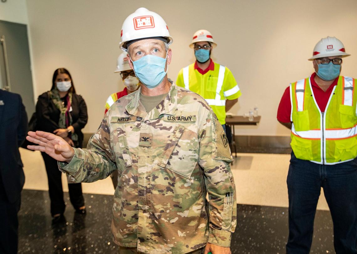 Colonel Andrew Kelly, Commander and District Engineer of the U.S. Army Corps of Engineers, Jacksonville District gives Miami Beach Mayor Dan Gelber, and City Manager Jimmy Morales a tour of the Miami Beach Convention Center as the Army Corps’ builds a coronavirus field hospital inside the facility on Wednesday, April 8, 2020.