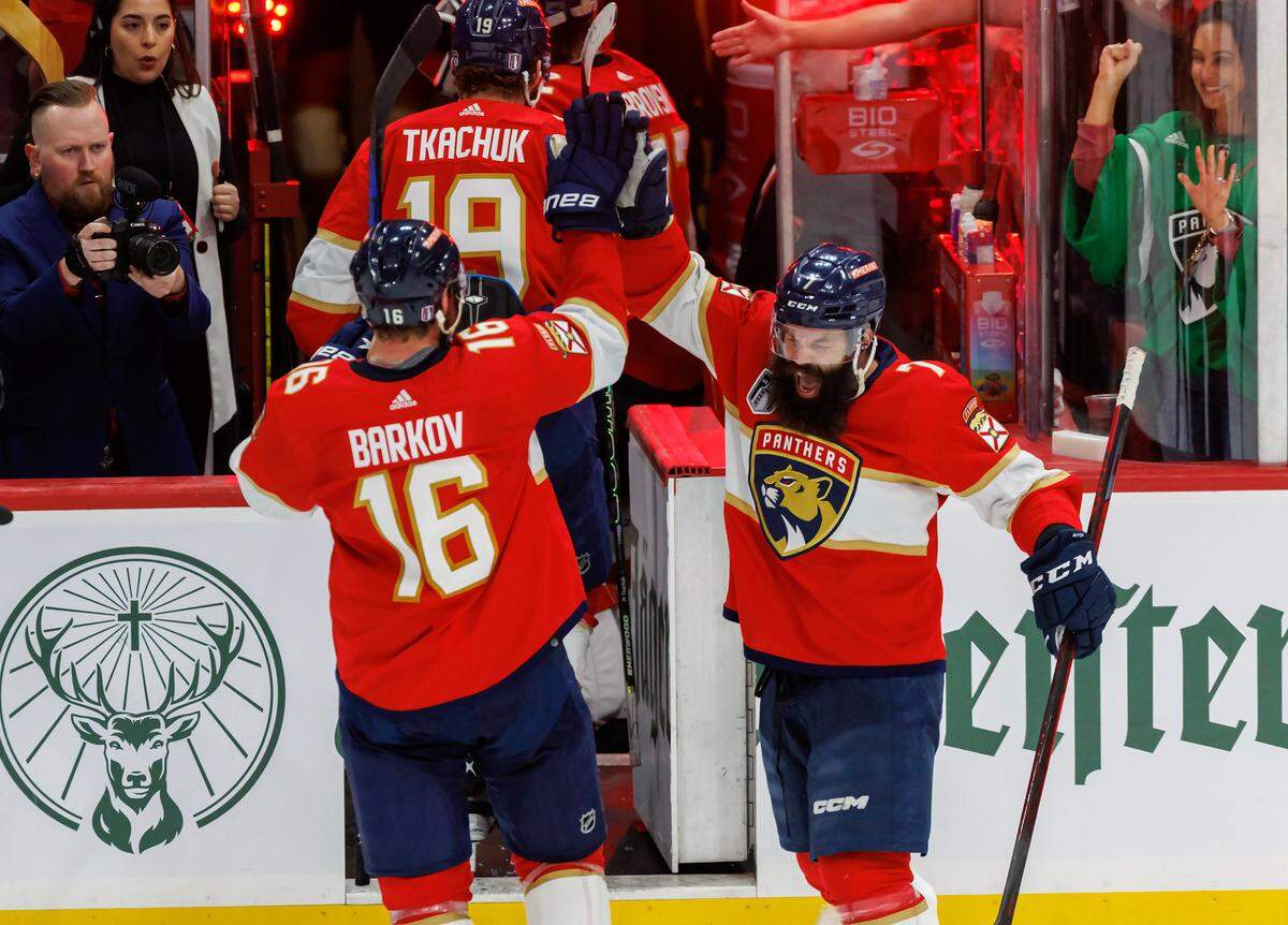 Florida Panthers center Aleksander Barkov (16) and Panthers defenseman Radko Gudas (7) celebrates their 3-2 overtime win over Vegas Golden Knights during of Game 3 of the NHL Stanley Cup Final at the FLA Live Arena on Thursday, June 8, 2023, in Sunrise, Florida.