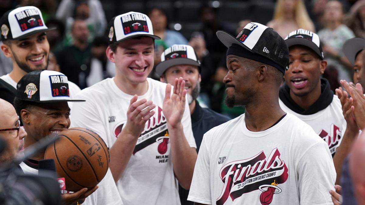 Miami Heat forward Jimmy Butler (22) celebrates after the Heat defeated the Boston Celtics in game seven of the Eastern Conference Finals for the 2023 NBA playoffs at TD Garden.