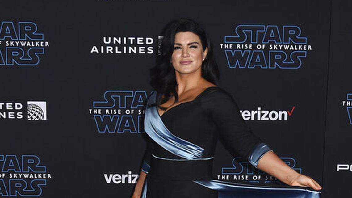 Gina Carano arrives at the world premiere of “Star Wars: The Rise of Skywalker” on Monday, Dec. 16, 2019, in Los Angeles. Carano is under fire Wednesday after she compared the U.S. political climate to Nazi Germany.