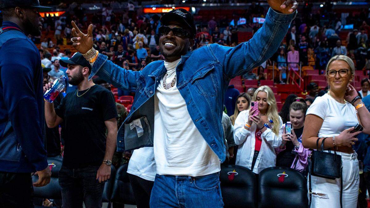 FILE - Former NFL wide receiver Antonio Brown reacts courtside after the Miami Heat defeated Detroit 105-98 after four quarters of an NBA game at FTX Arena in Downtown Miami, Florida, on Tuesday, March 15, 2022.
