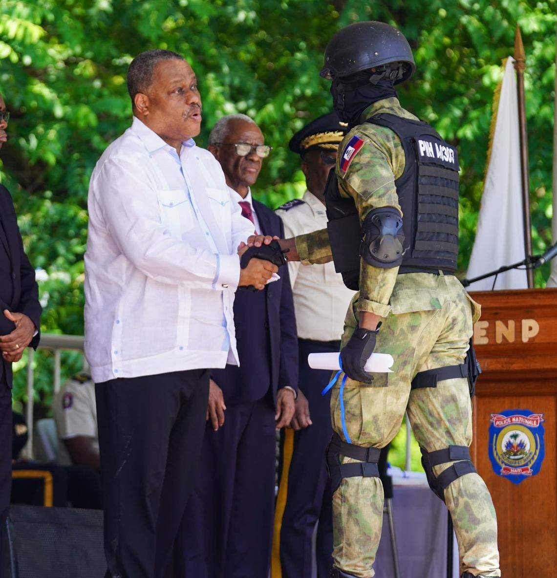 Haiti Prime Minister Garry Conille on Tuesday, June 18, 2024 welcomes 455 newly trained specialized police officers in a ceremony at the National Police Academy in Port-au-Prince.