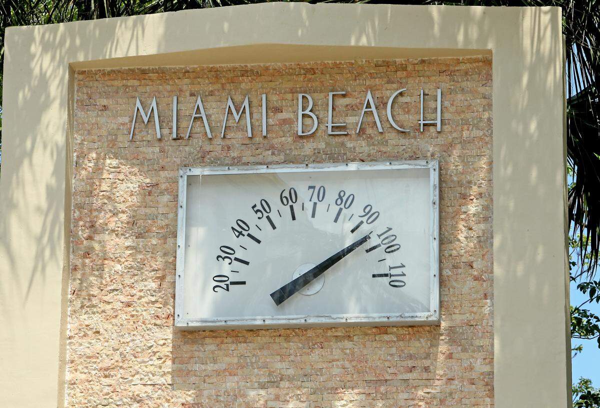 A view of the large thermometer on Ocean Drive on June 3, 2019, in Miami Beach, Florida. The temperatures may not quite hit this mid-90s high on the weekend of March 5-6, 2022, but as the week progresses the National Weather Service said parts of Florida, like the interior Everglades and Tampa could hit above 90. Orlando could also approach the upper 80s and 90.