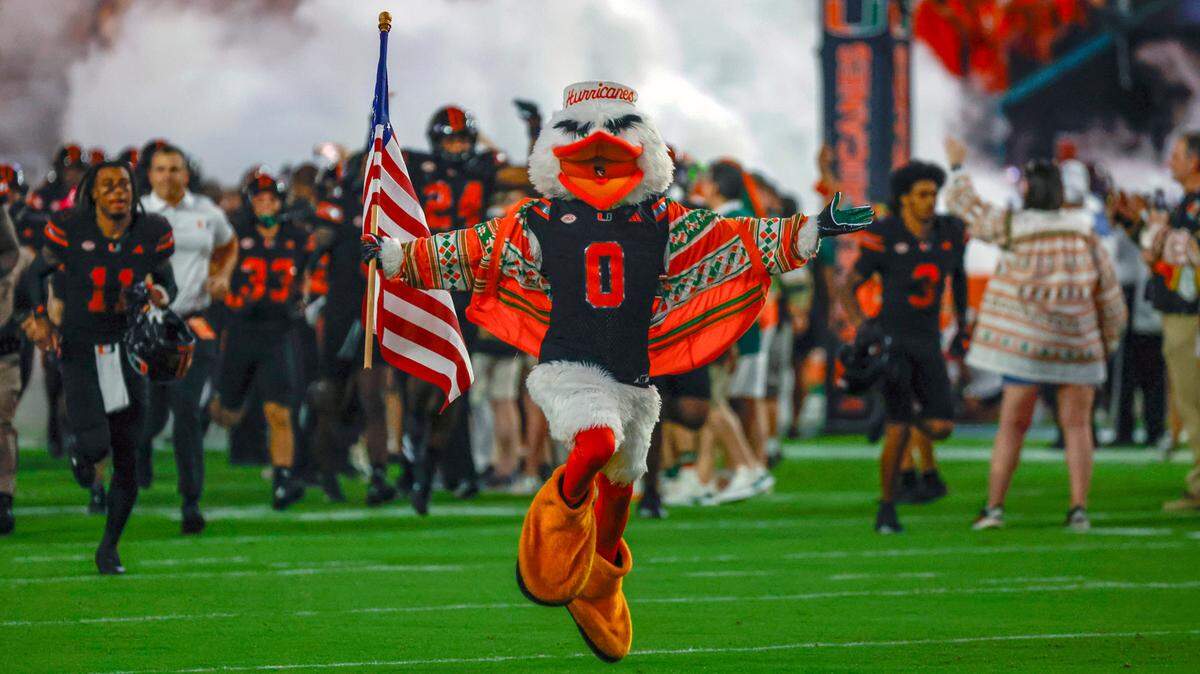 Miami Hurricanes mascot, Sebastian the Ibis, rushes the field with the Miami Hurricanes to start the game against the Florida State Seminoles in the first half during an NCAA football game at Hard Rock Stadium in Miami Garden, Florida on Saturday, October 26, 2024.