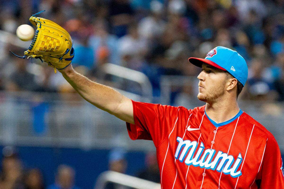 Miami Marlins pitcher Trevor Rogers (28) catches the ball during the first inning of an MLB game against the Atlanta Braves at loanDepot park in the Little Havana neighborhood of Miami, Florida, on Saturday, July 10, 2021.